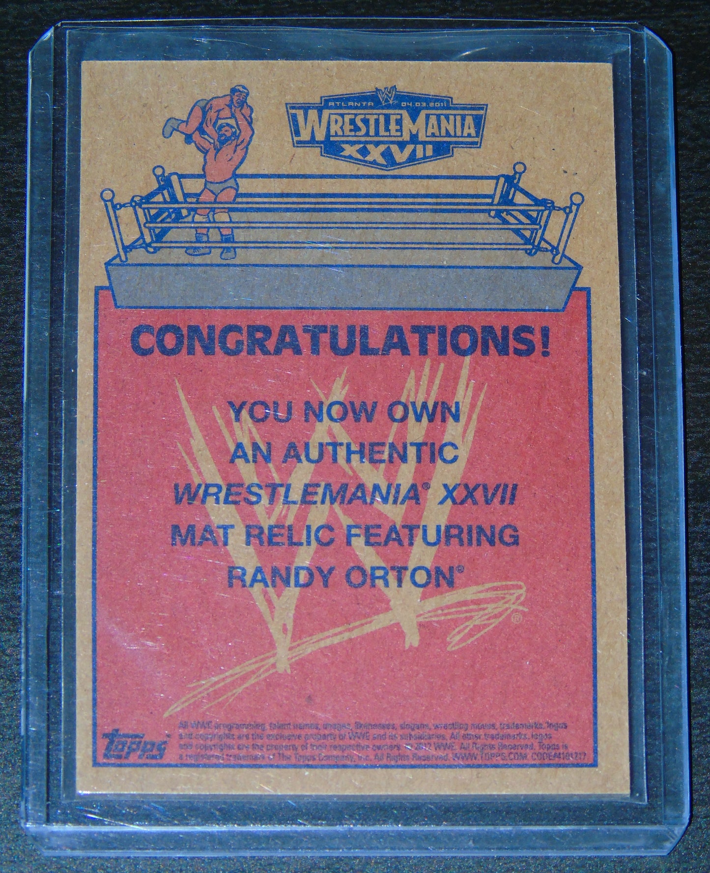 RANDY ORTON WWE WRESTLING TOPPS WRESTLEMANIA XXVII AUTHENTIC RING MAT RELIC TRADING CARD