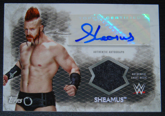 SHEAMUS SIGNED WWE TOPPS TRADING CARD WITH SHIRT RELIC