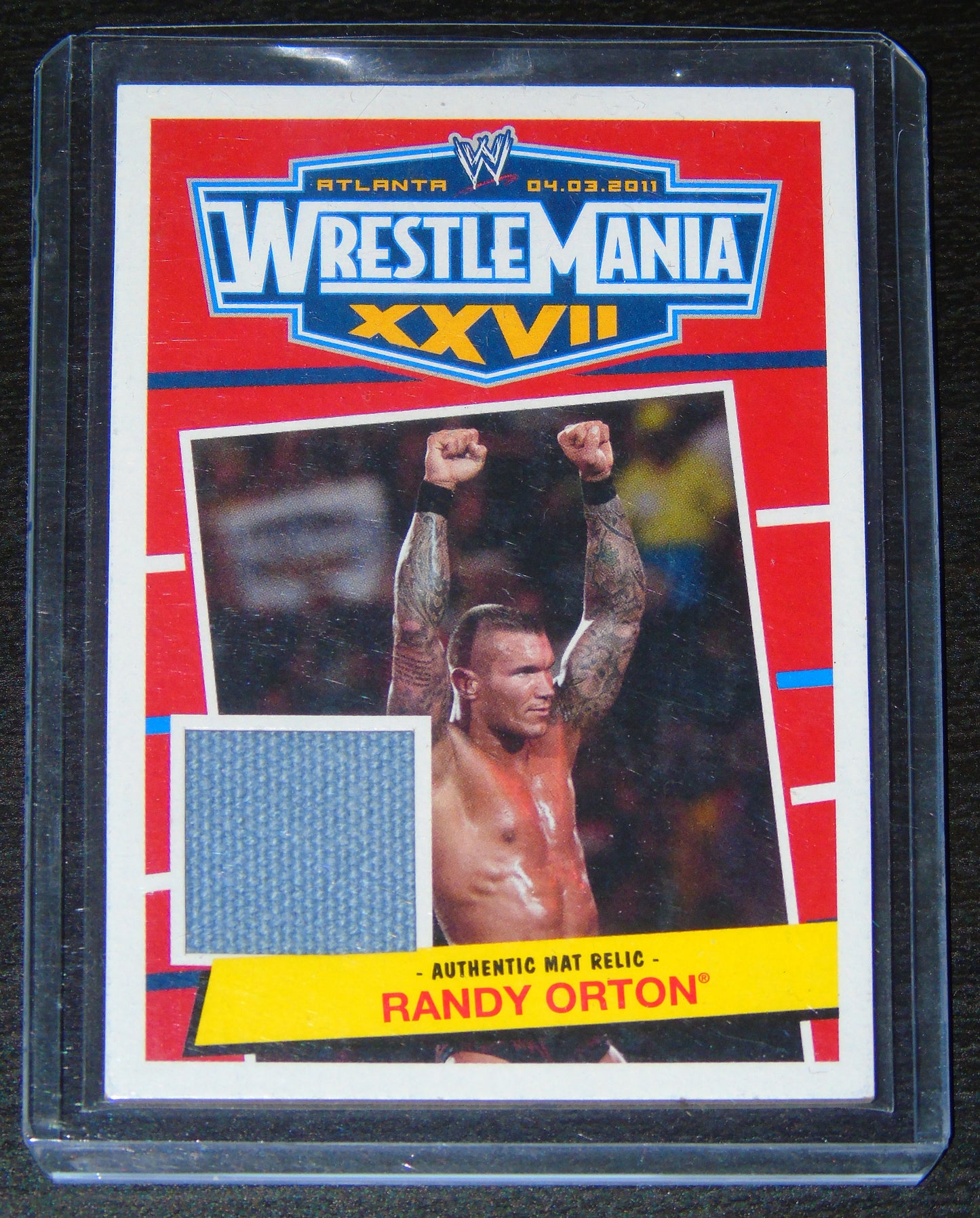 RANDY ORTON WWE WRESTLING TOPPS WRESTLEMANIA XXVII AUTHENTIC RING MAT RELIC TRADING CARD